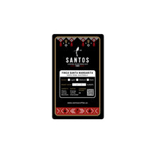 Load image into Gallery viewer, Close-up of Santos Coffee Santa Margarita label showing Medium-Dark roast, elevation 4,600 ft, and flavor notes of orange, toffee, and chocolate.