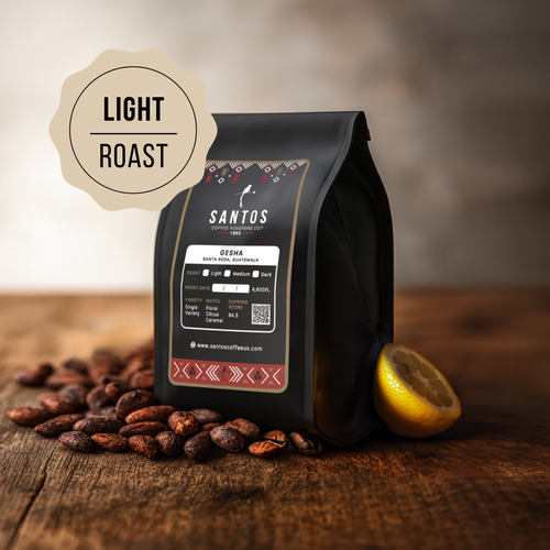 Santos Coffee Gesha Light roast coffee bag, surrounded by cocoa beans, a lemon slice, and warm wooden textures.